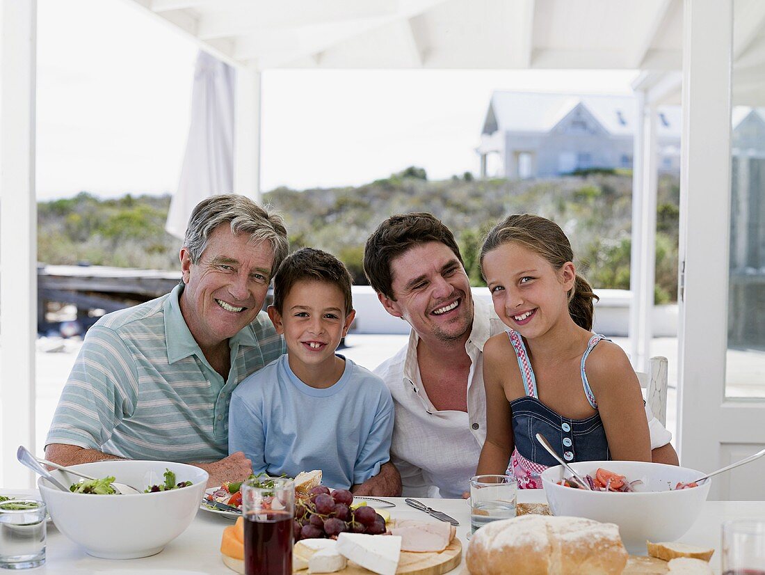 A family meal eating in the open-air