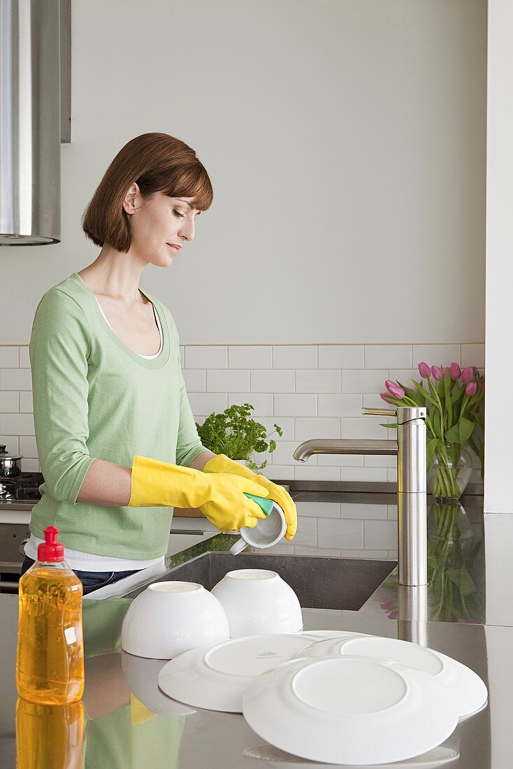 A woman washing up