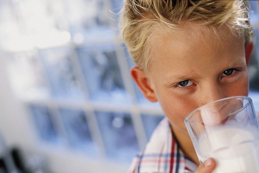 A boy drinking milk