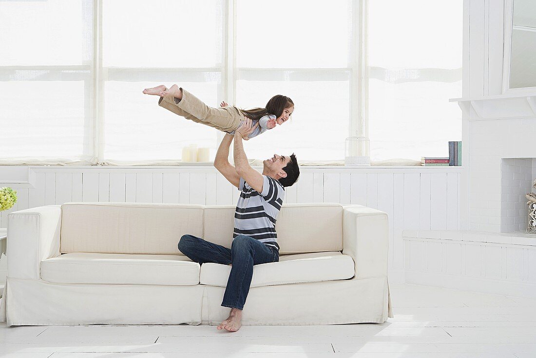 Father playing with daughter