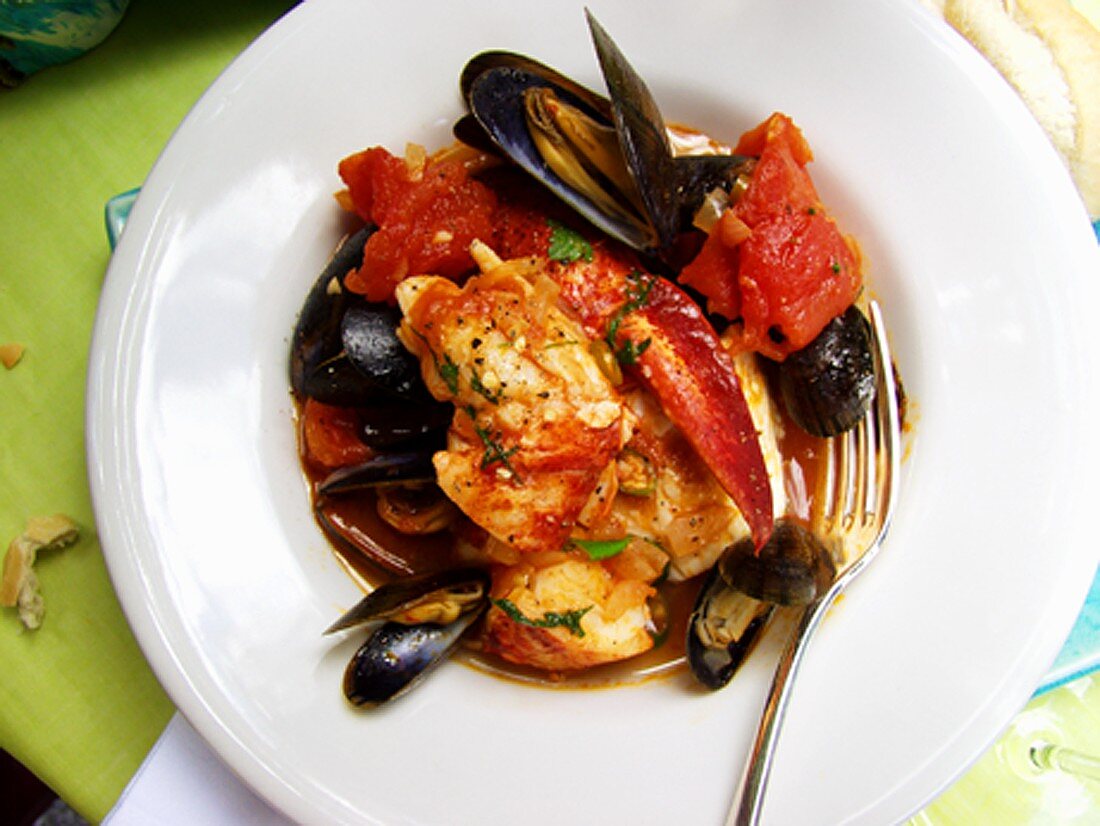 Creole lobster and mussel stew with tomatoes