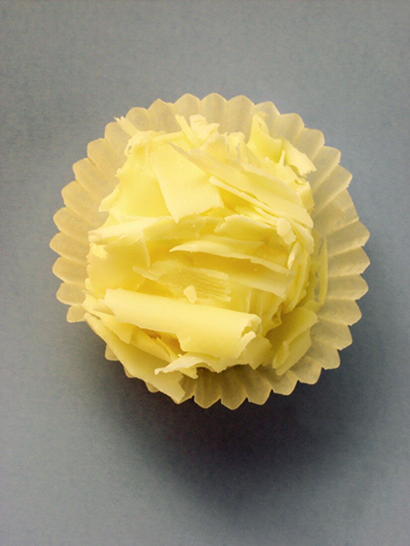 White chocolate truffle in paper case