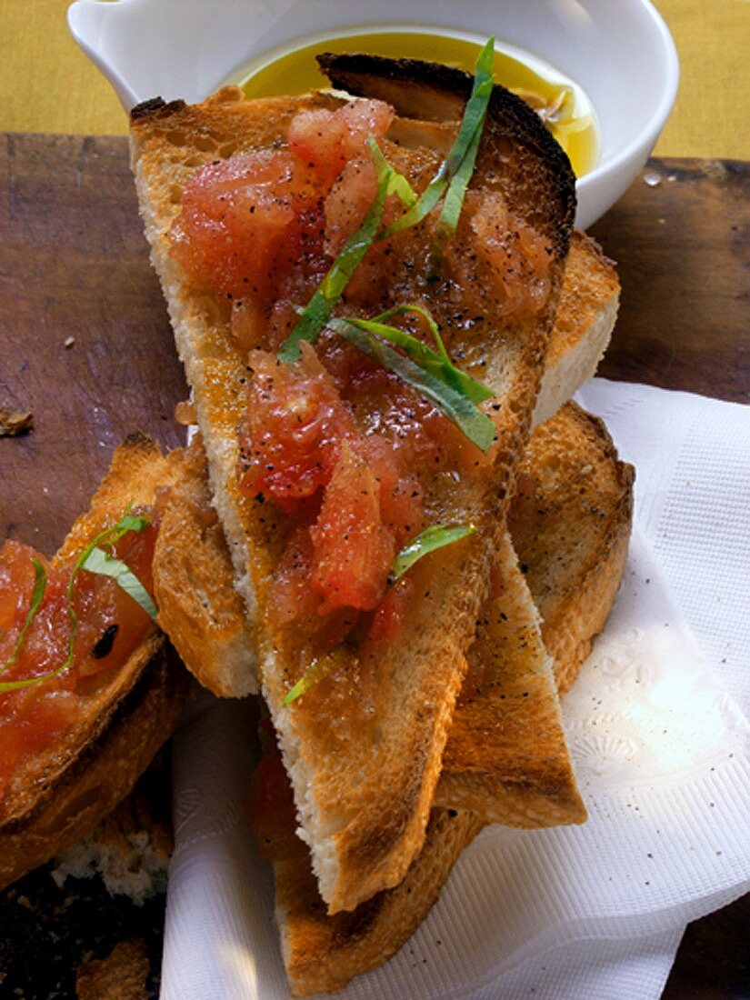 Bruschetta on strips of basil