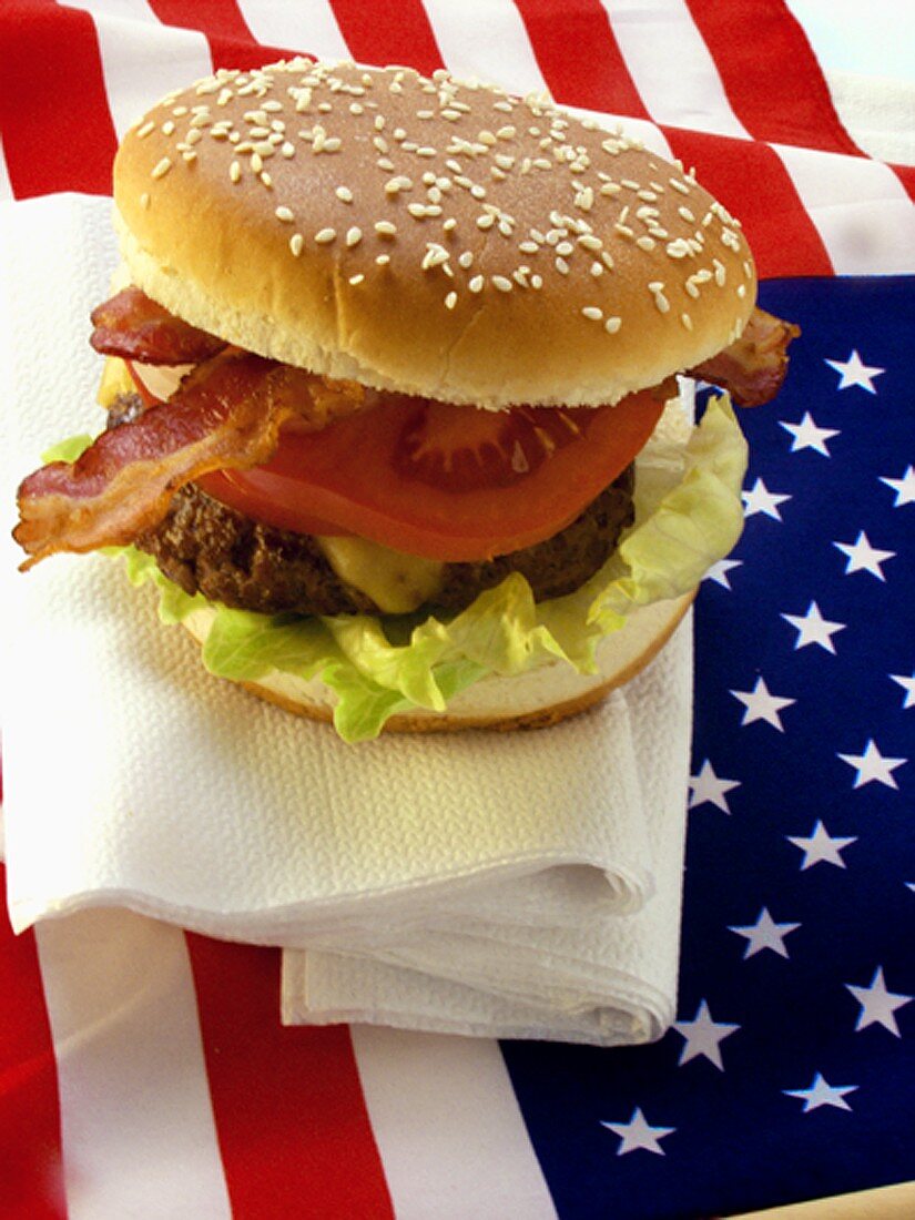 Hamburger with bacon on American flag