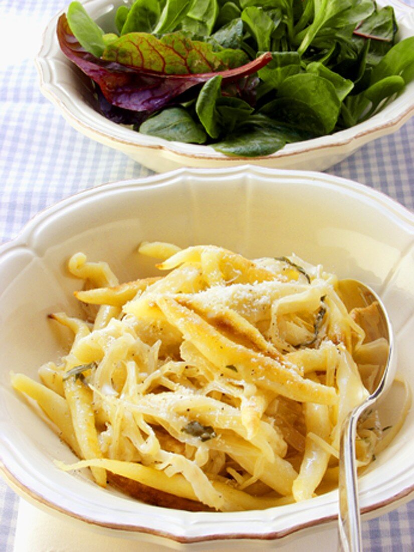 Potato noodles with white cabbage & cream sauce; lettuce