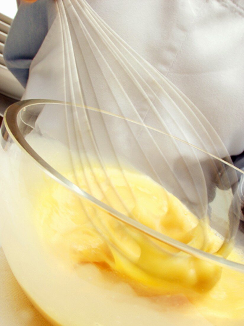 Beating eggs with whisk