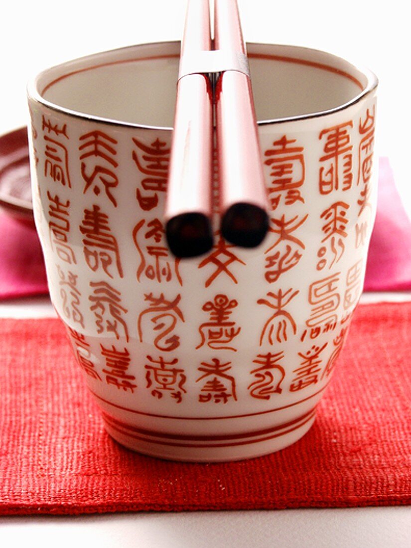 Asian bowl with chopsticks