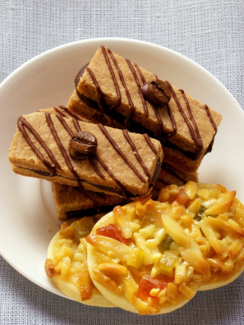 Florentines and espresso biscuits on plate