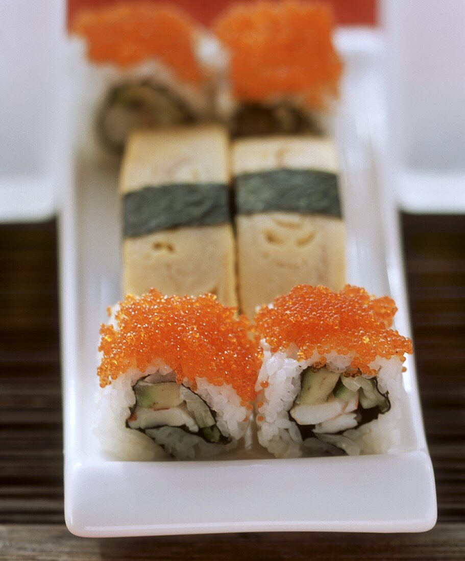 Nigiri sushi with egg custard & Maki sushi with salmon caviare