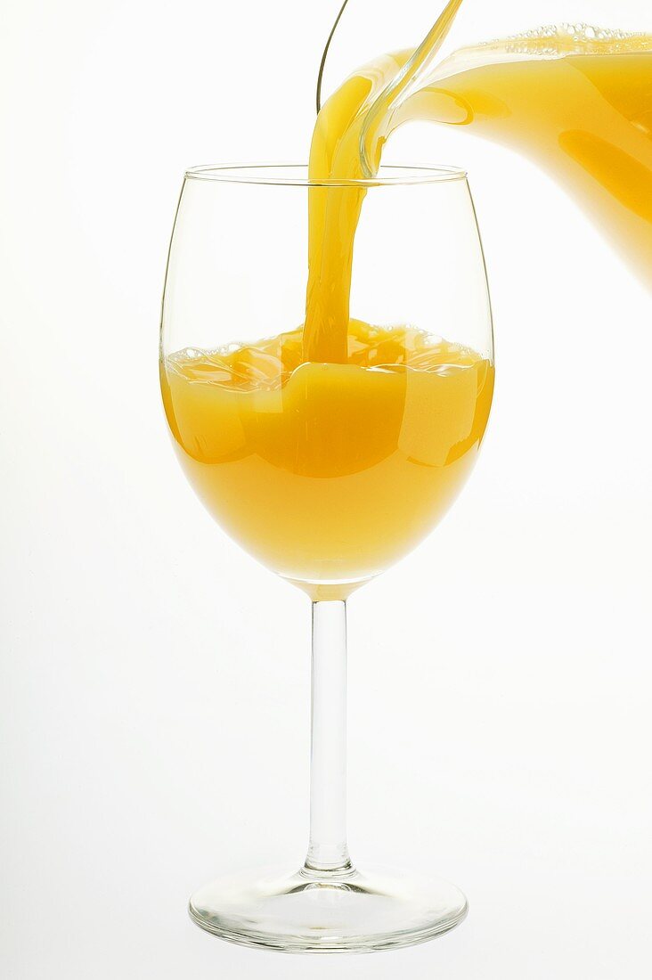 Pouring orange juice