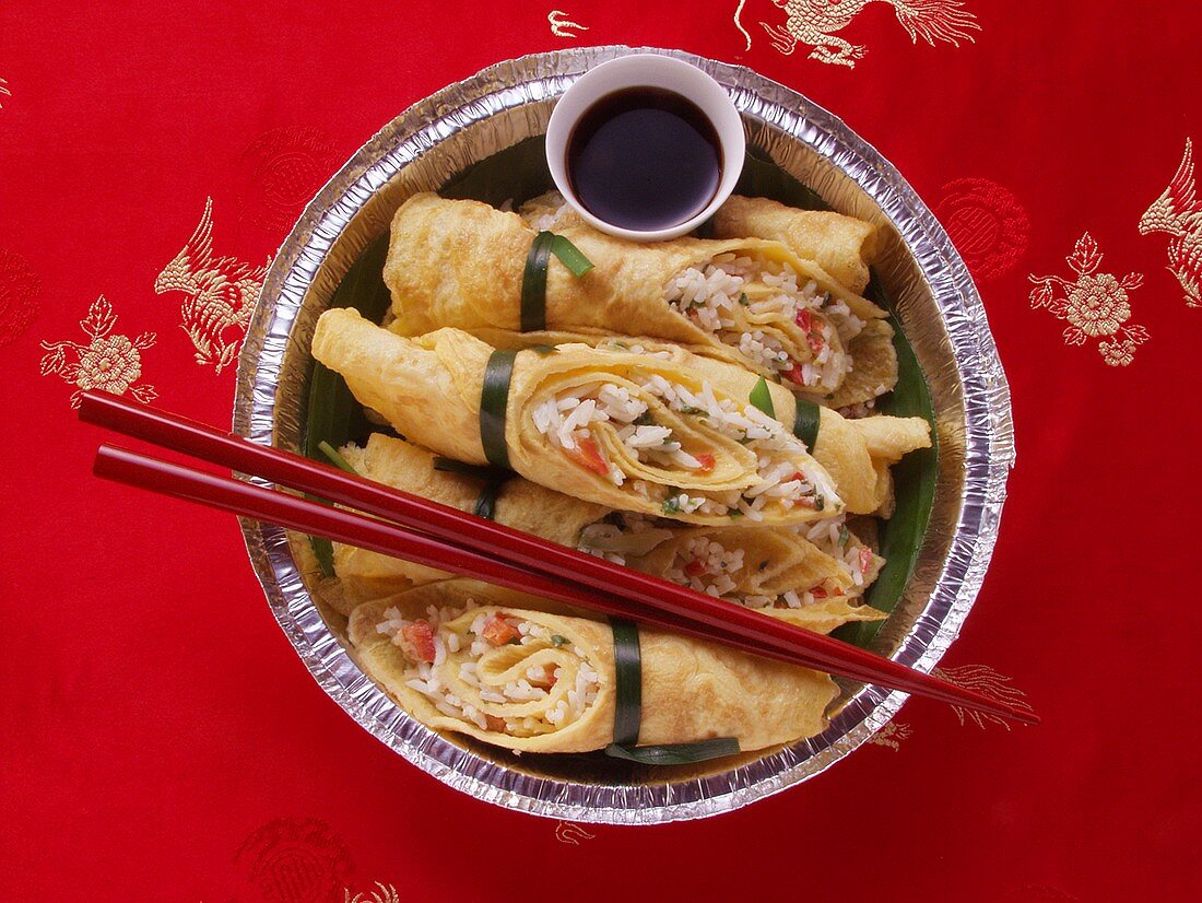 Chinese lucky rolls with rice filling and soy sauce