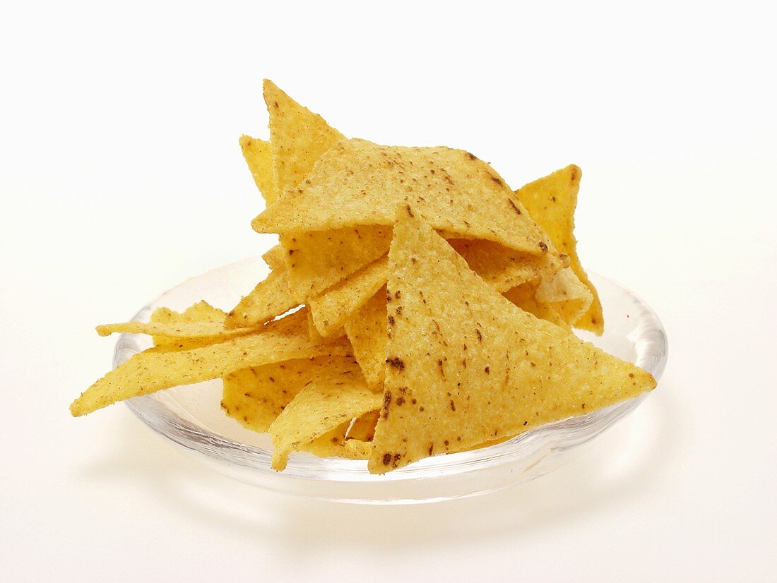 Tortilla chips on glass plate