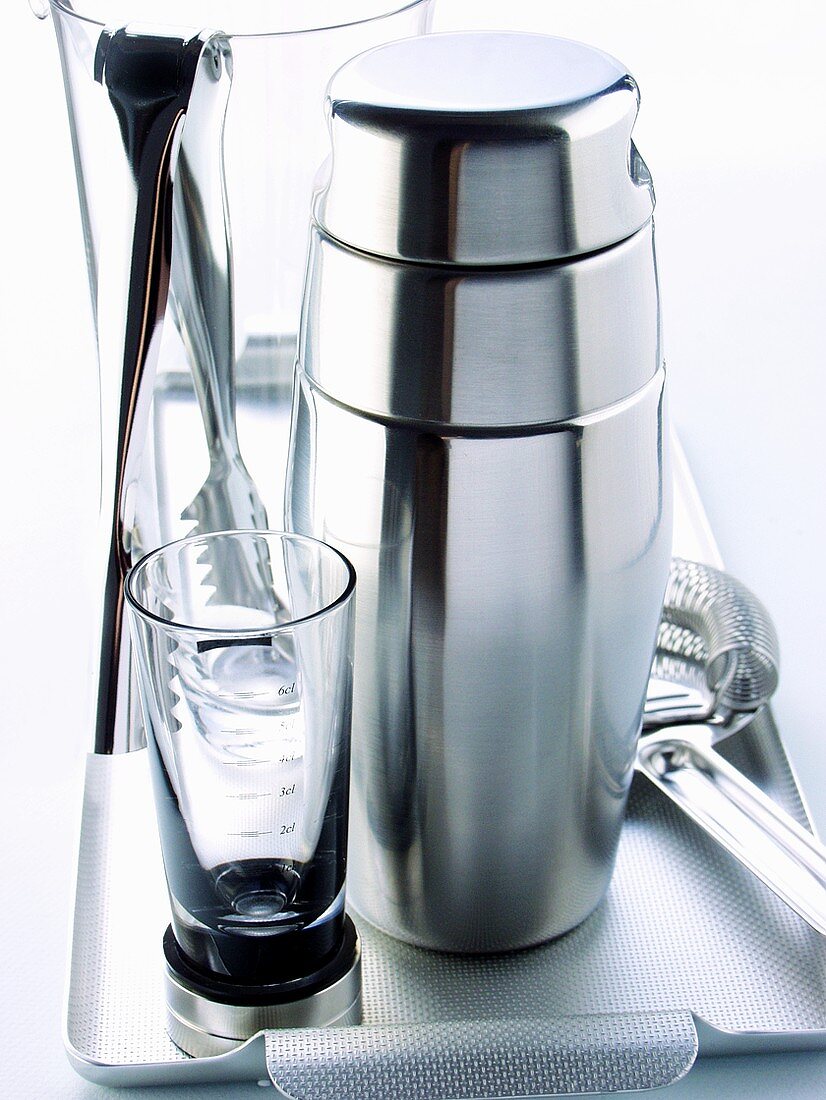 Various bar utensils on tray