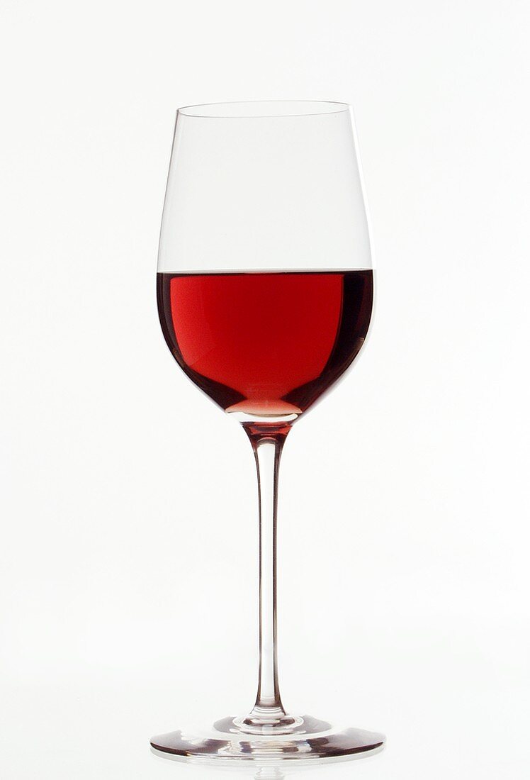 Red wine glass, half filled