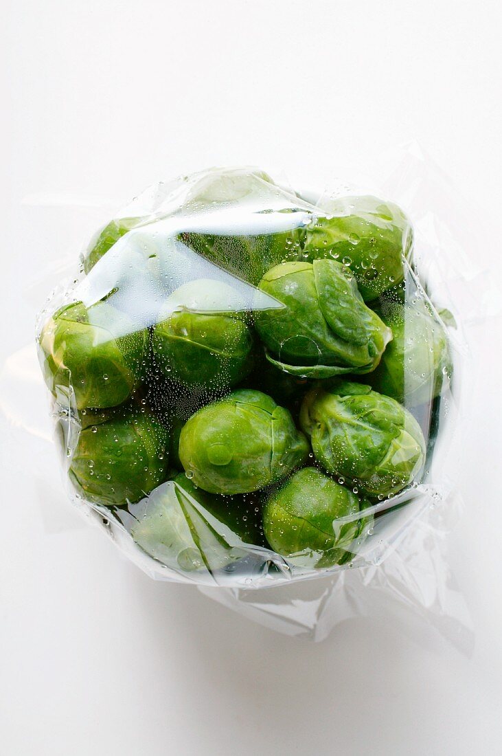 Brussels sprouts, covered with food wrap