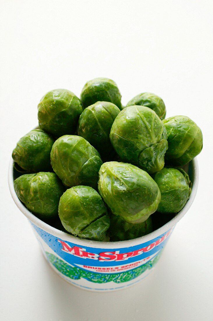 Fresh Brussels sprouts in container