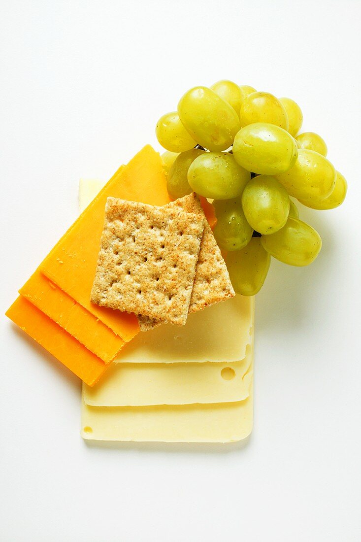 Extra Sharp Cheddar & American cheese with grapes, cracker