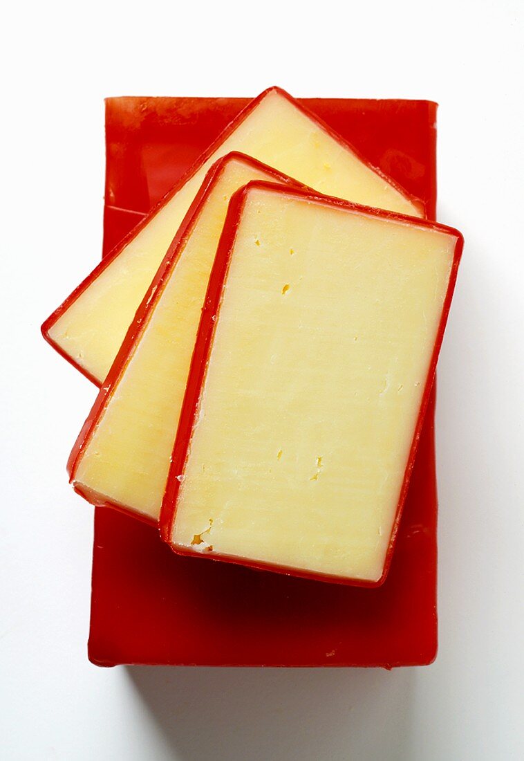 Three slices of Vermont Cheddar on a cheese