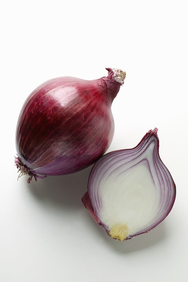 Whole and half red onion