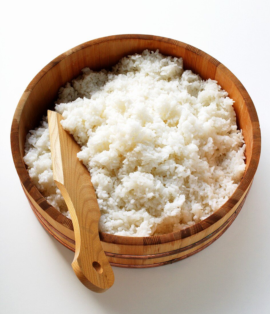 Boiled sushi rice in wooden bowl