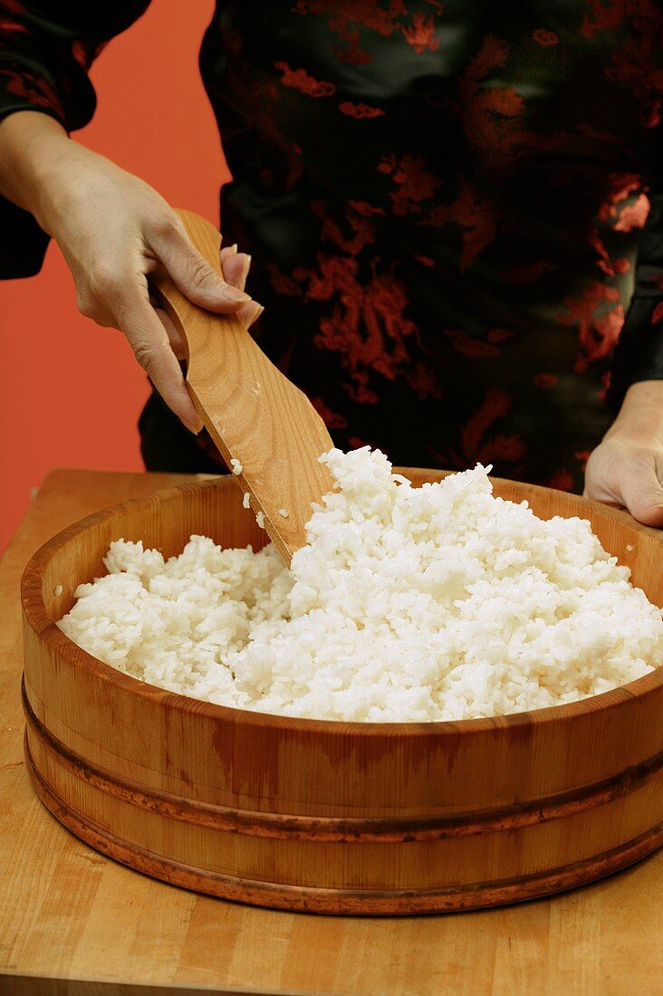 Stirring sushi rice
