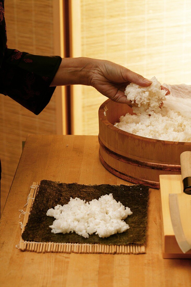 Preparing maki sushi