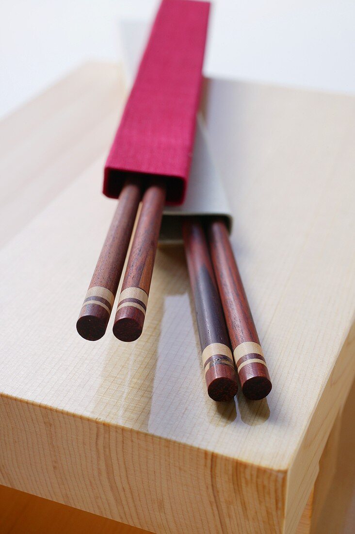 Japanese chopsticks on wooden board