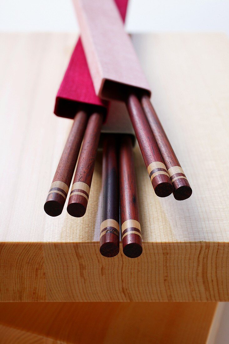 Japanese chopsticks on wooden board