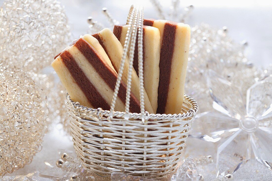 Two-colour cookies in silver basket