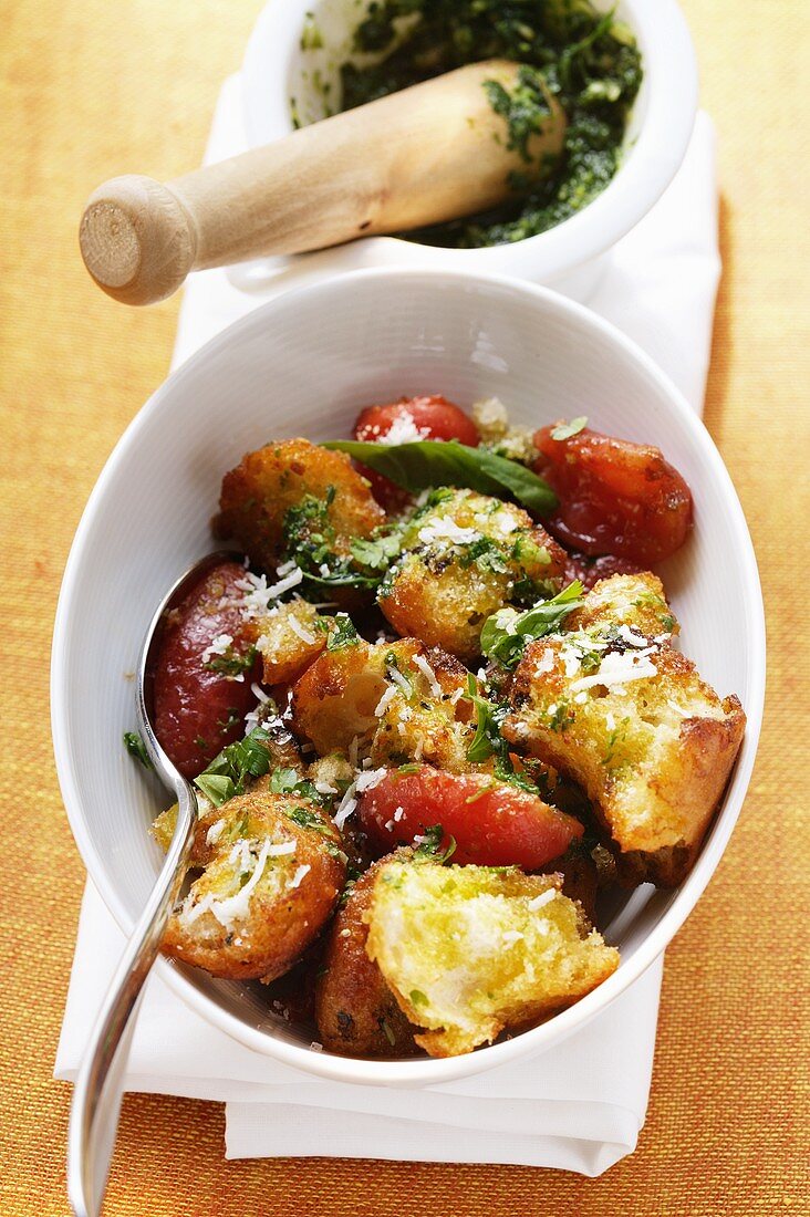Bread salad with pesto and tomatoes