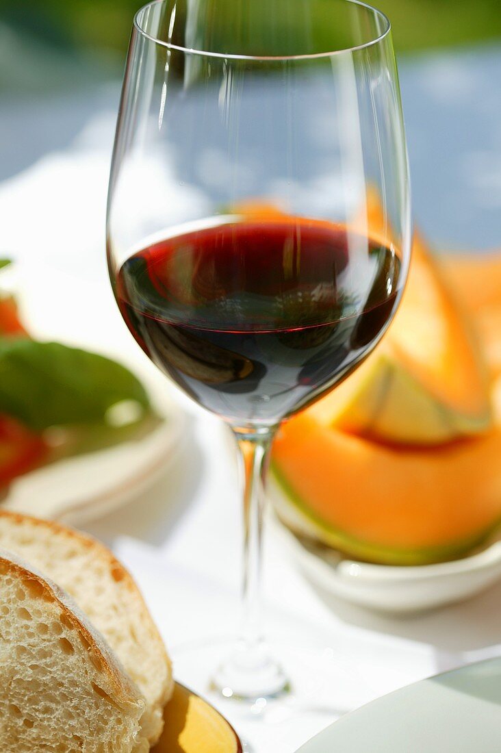 Glass of red wine on Mediterranean table