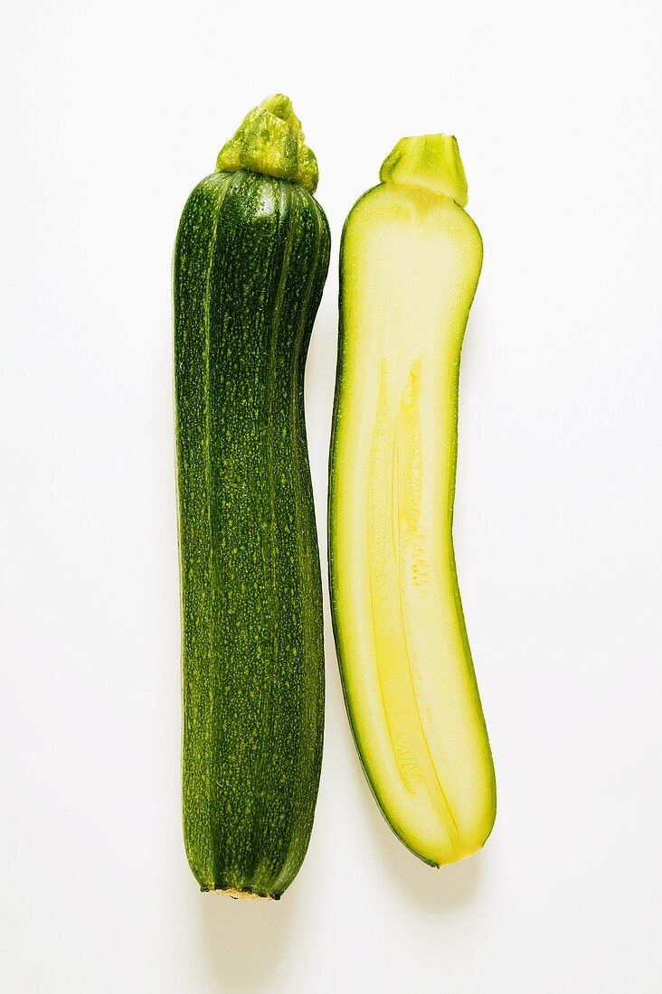 Whole and half courgette