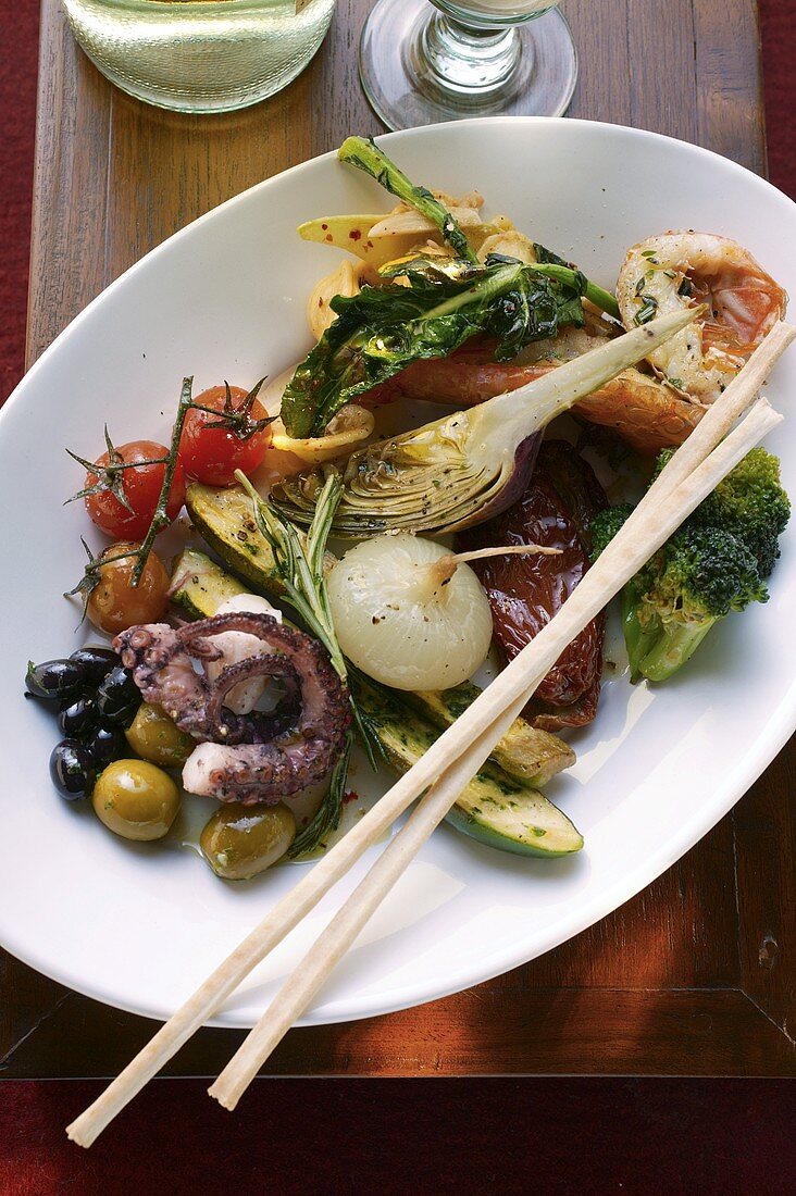 Antipasti platter of marinated vegetables & seafood