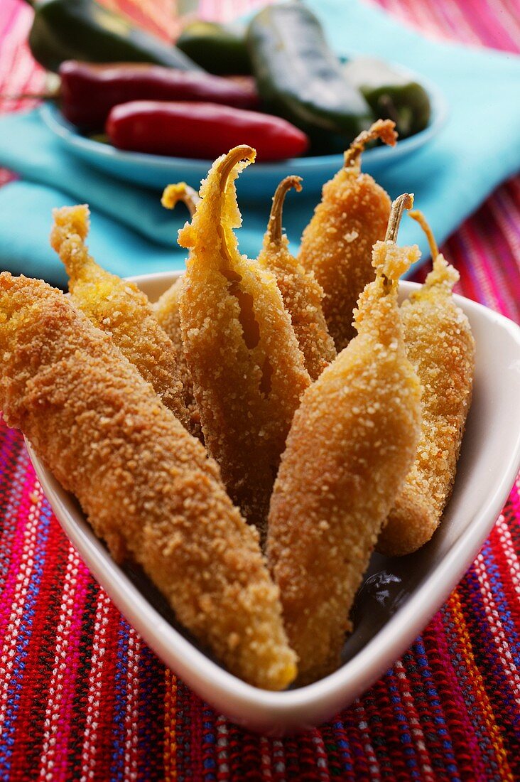 Breaded chillies stuffed with sheep's cheese