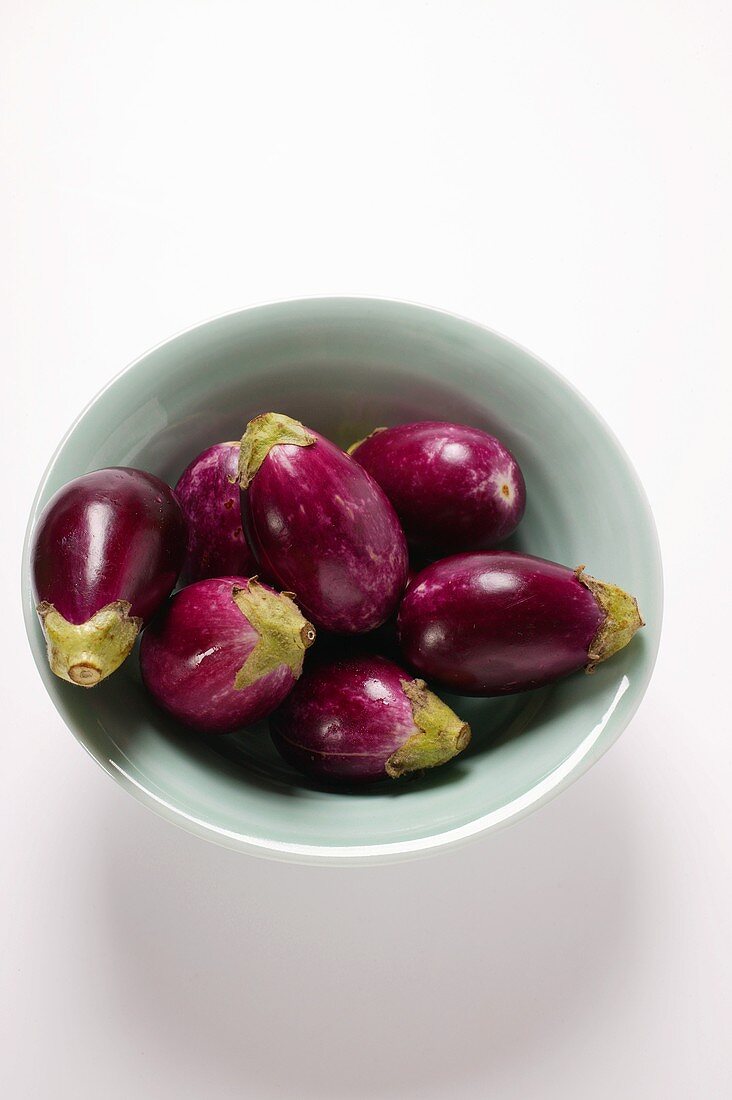 Mini-aubergines in bowl