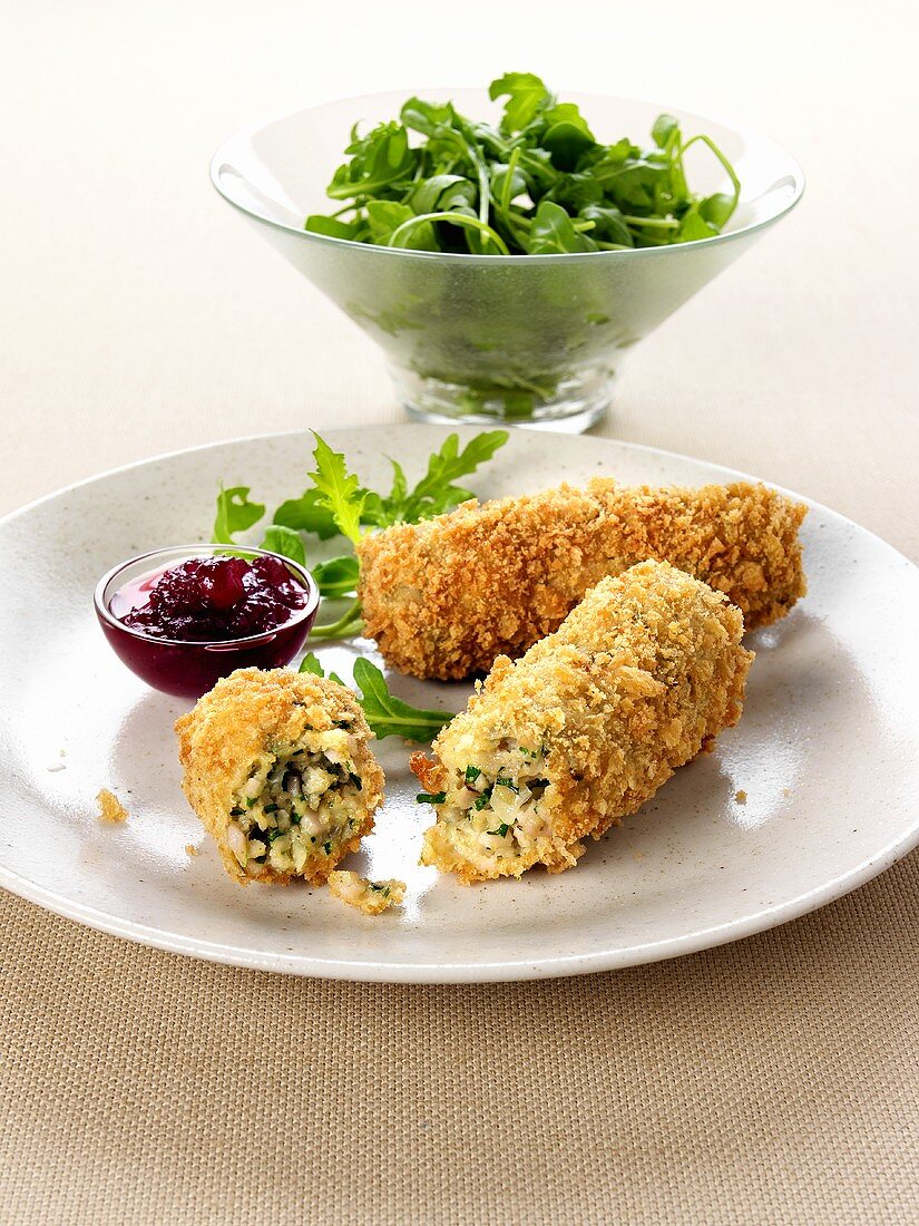 Turkey croquettes with rocket salad and cranberry sauce