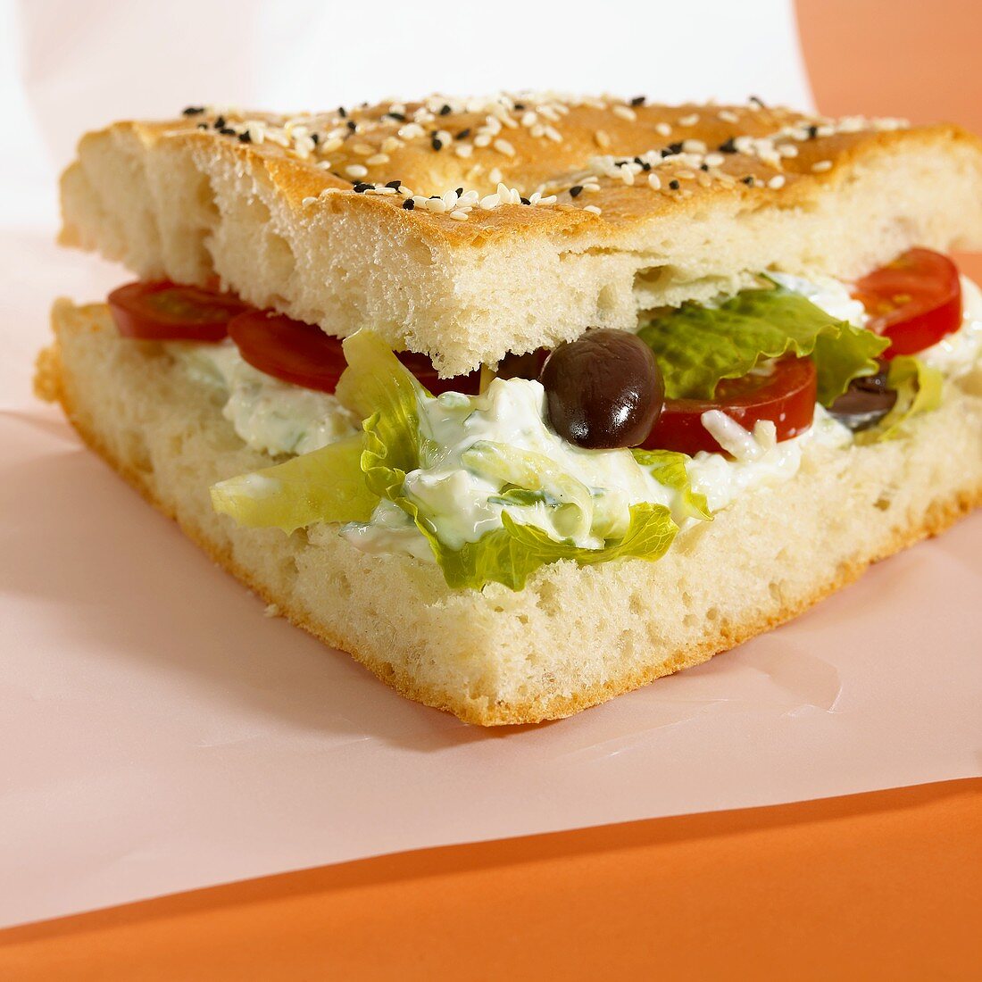 Pita bread filled with vegetables and soft cheese