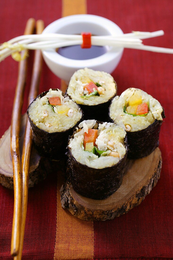 Raw vegetable sushi with sauerkraut, peppers and sprouts