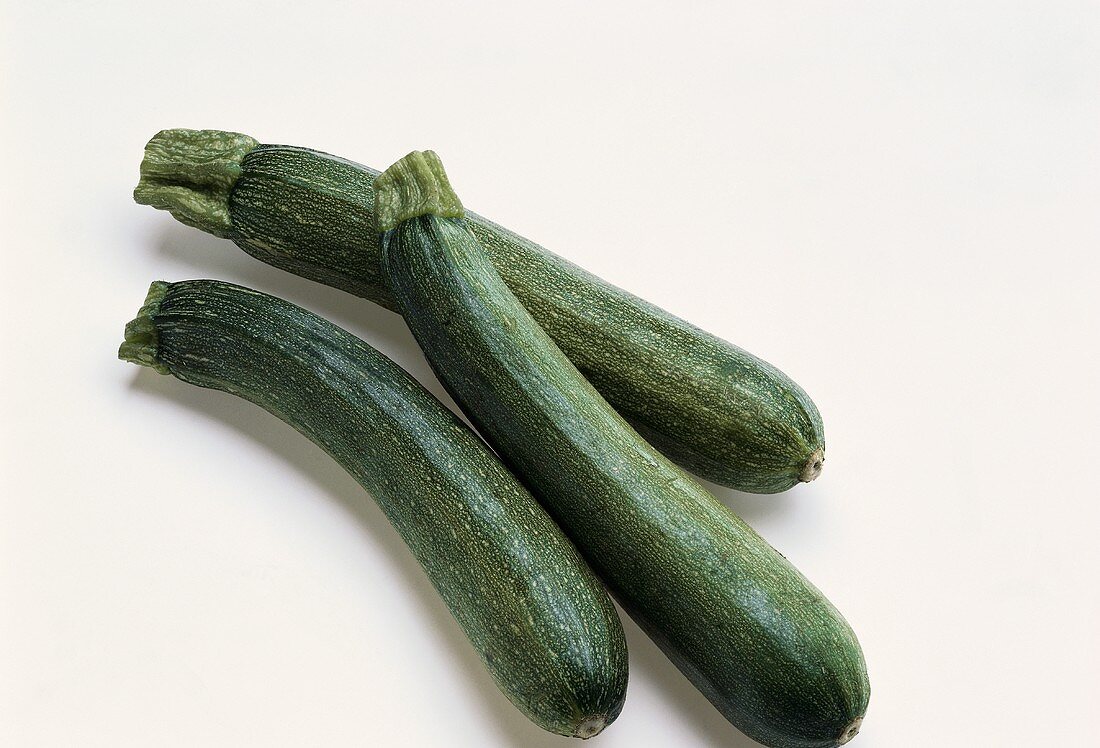 Three young courgettes