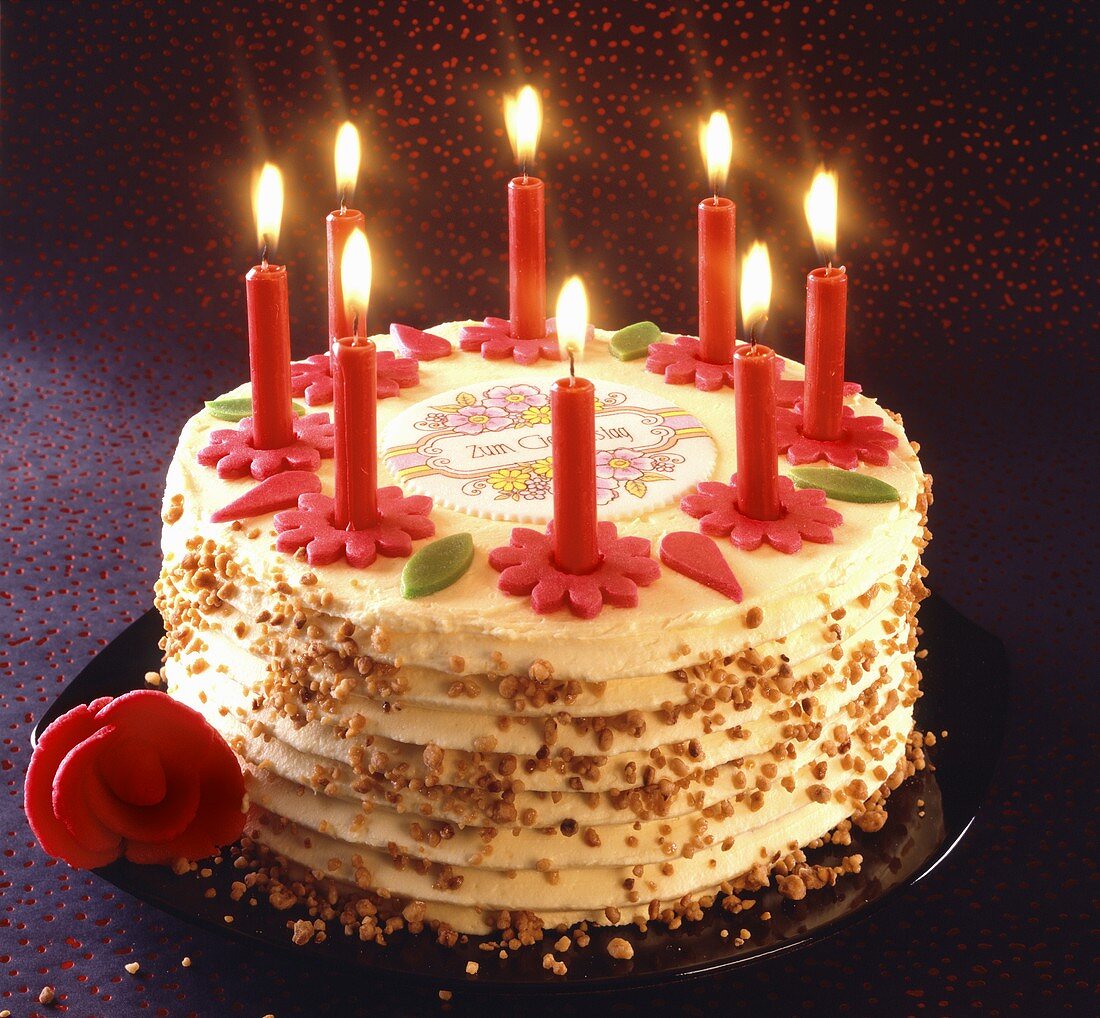 Birthday cake with burning candles