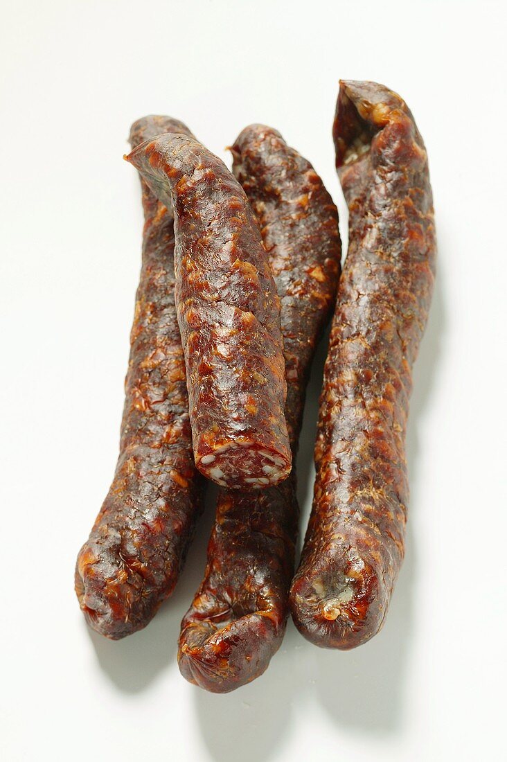 Four venison sausages