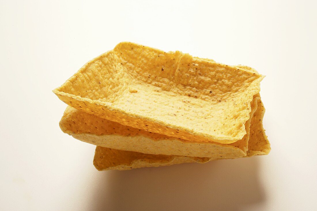 Square taco shells, in a pile