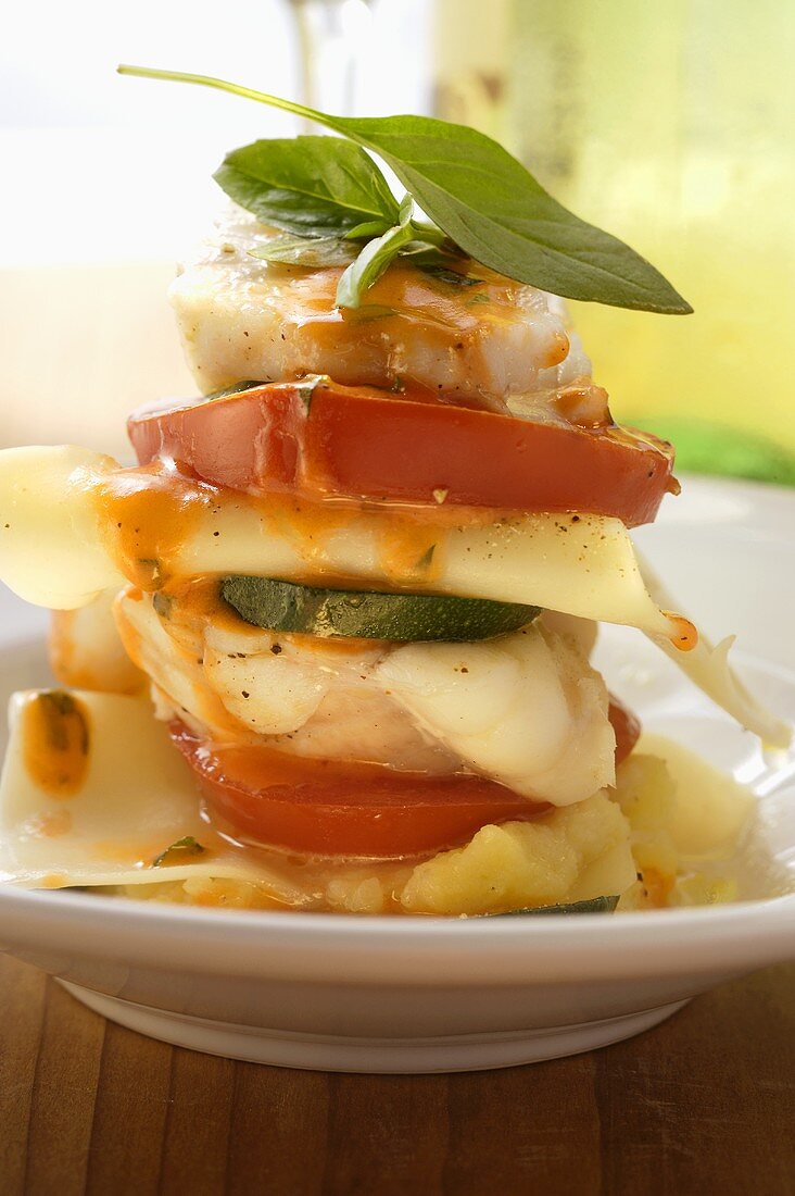 Monkfish lasagne with tomatoes and courgettes