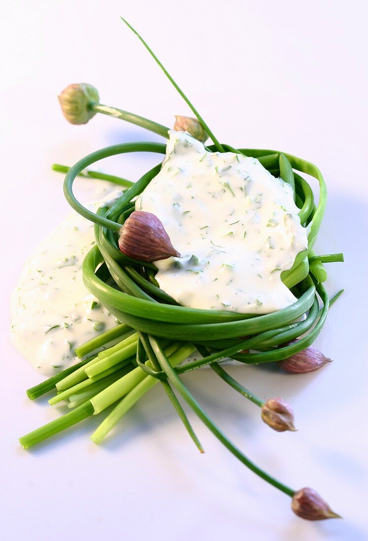 A blob of herb mayonnaise and fresh chives