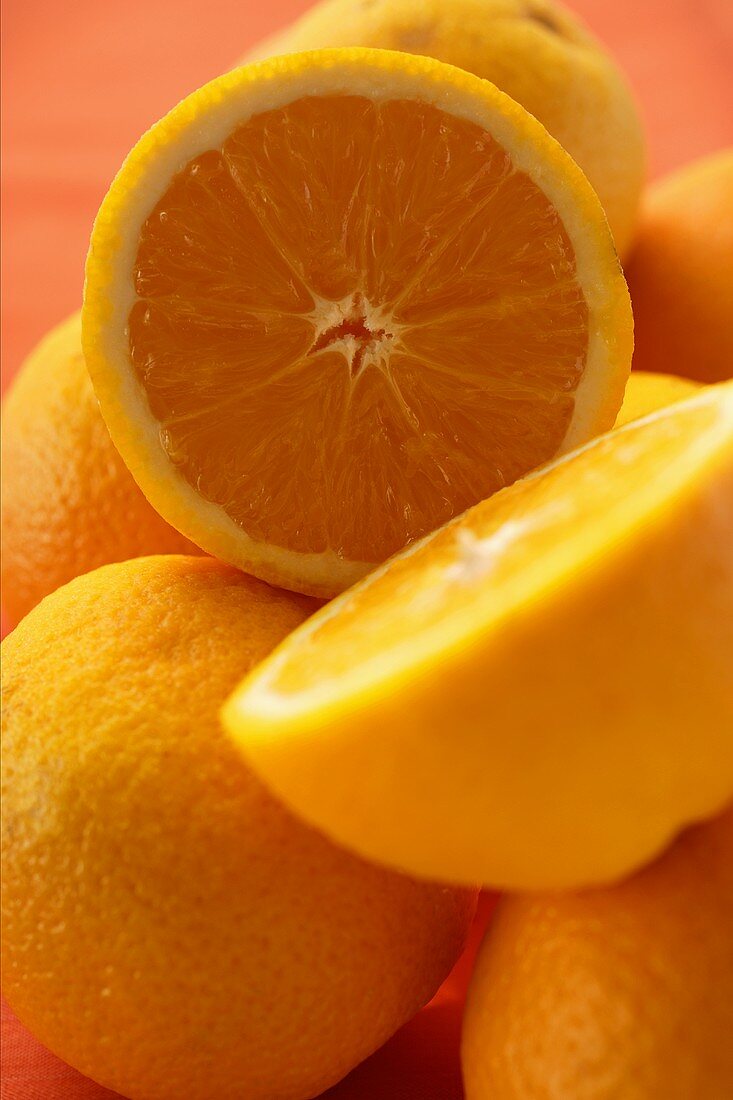 Whole and half oranges