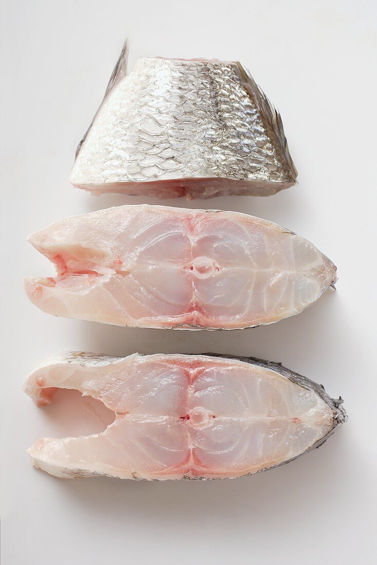 Sea bass cutlets and piece of tail