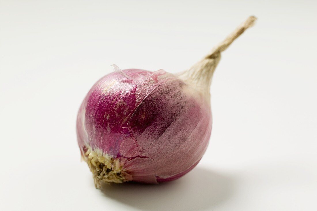 Red Onion Partially Peeled