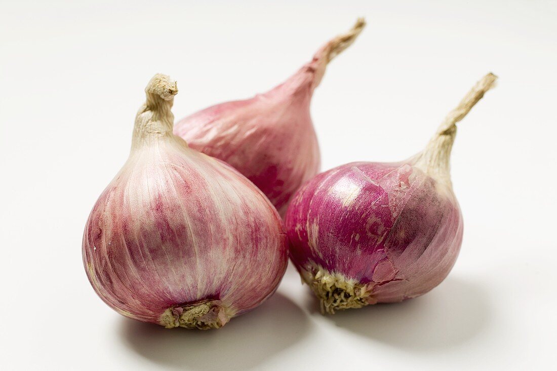 Three red onions