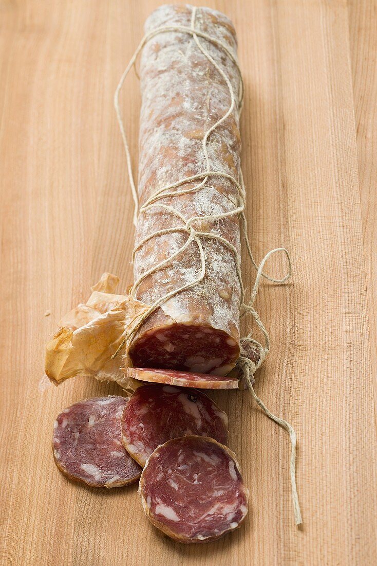 Italian salami with slices cut