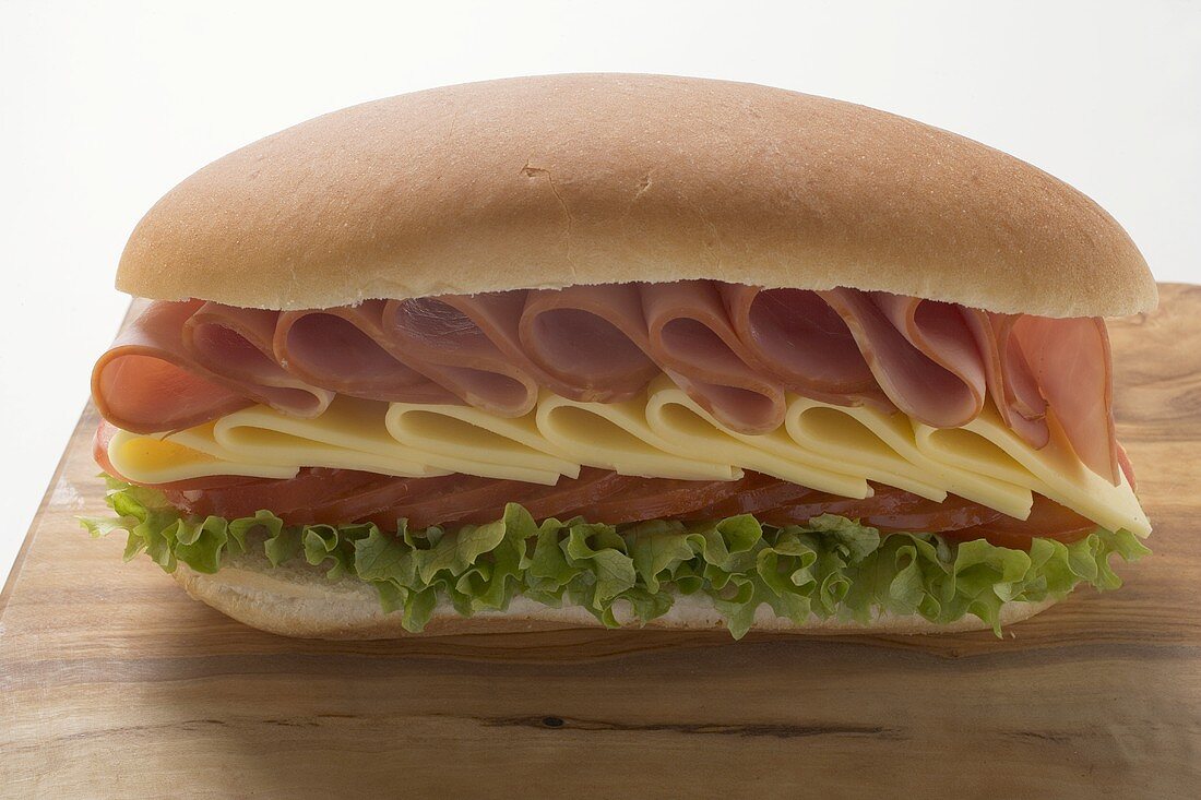 Ham, cheese, tomato and lettuce sandwich